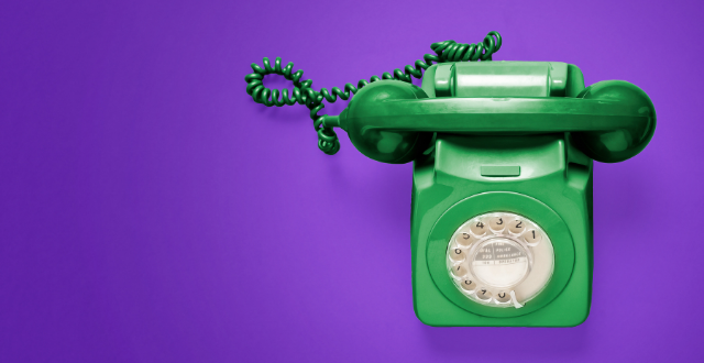 green rotary phone on a royal purple background. Allison Nelson recommends just talking to your ideal clients!