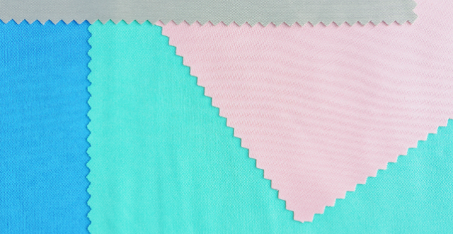blue, grey, teal, and pink fabric overlapping