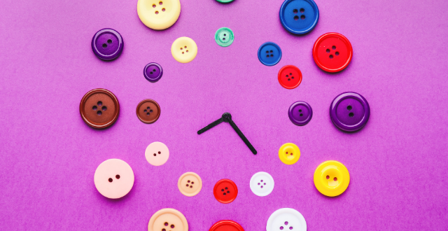 buttons create a clock on a purple background