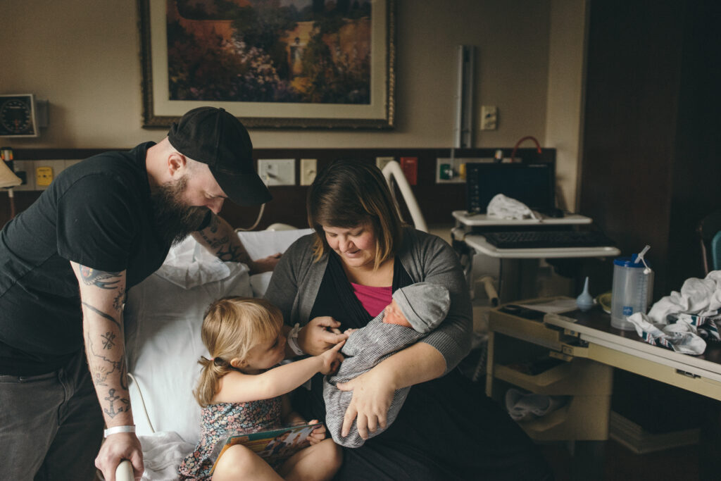 Deanna Seymour holds her new son on the edge of the hospital bed while her husband and daughter greet him. You have permission to make whatever content plan works for you, just like you can raise your human babies in whatever way that works best for you and them. 