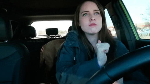 gif of a girl dancing in a car, front seat dancing