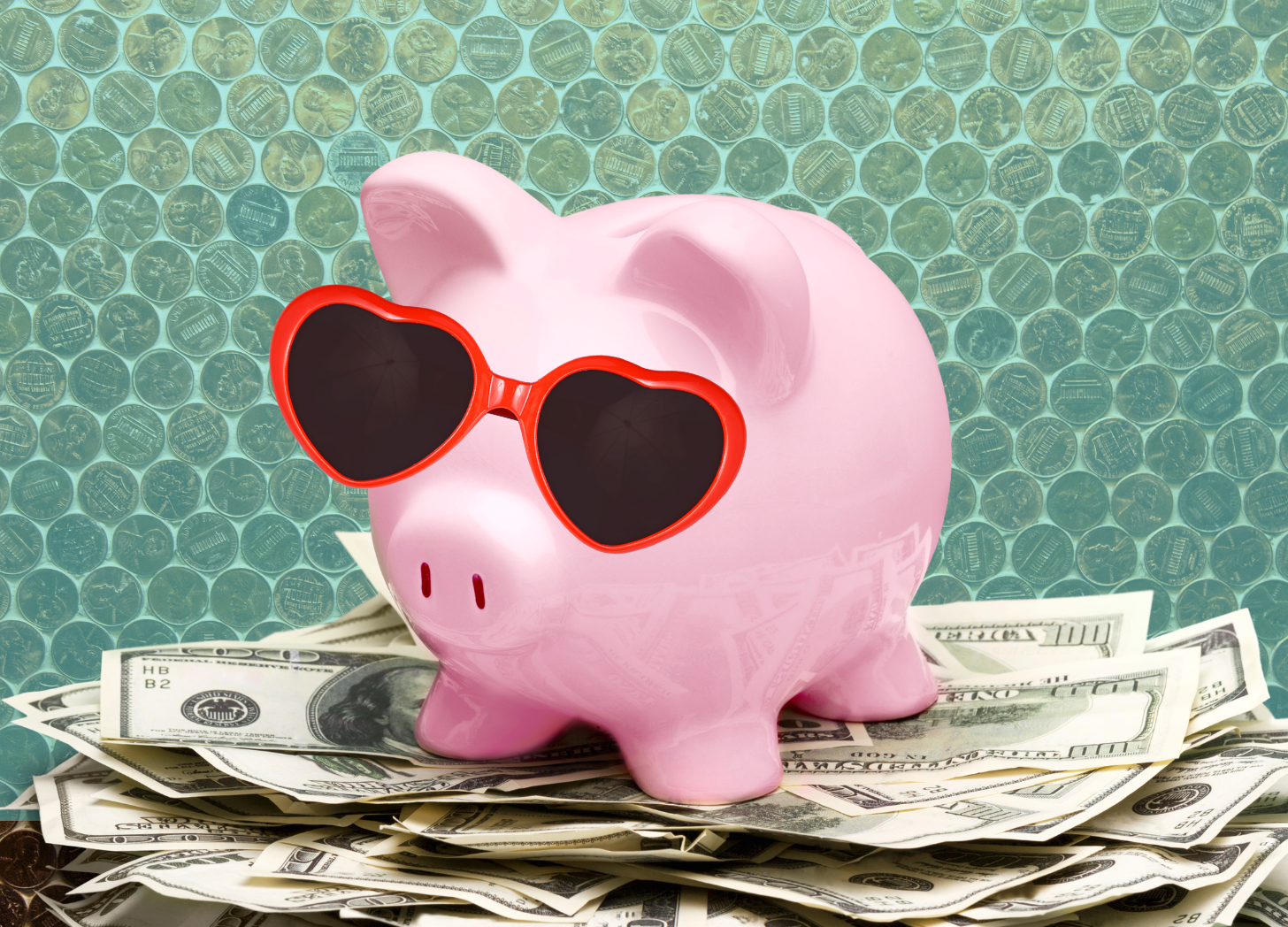 A pink piggy bank with heart-shaped sunglasses sits confidently on a pile of dollar bills, symbolizing the spirit of online business rebels who break traditional financial rules and embrace unconventional success.