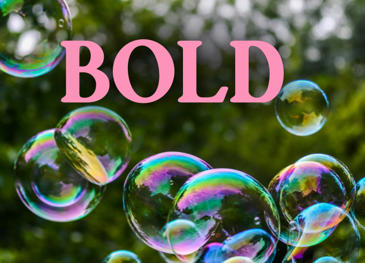 Colorful soap bubbles float against a blurred, natural green background, with the word 'BOLD' in large, pink letters at the center. This image captures the essence of creative and impactful content, perfect for entrepreneurs, small businesses, and online business owners. Inspired by Deanna Seymour's approach to making content drive business success